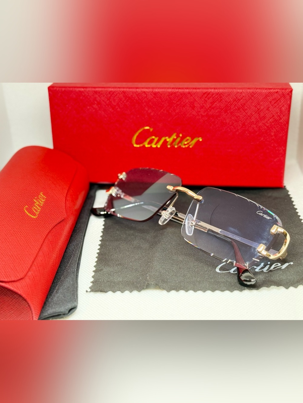 Cartier Rimless Sunglasses with Gold Accents and Gradient Blue Lenses